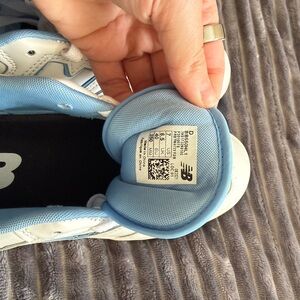 New Balance White and Light Blue Athletic Shoes